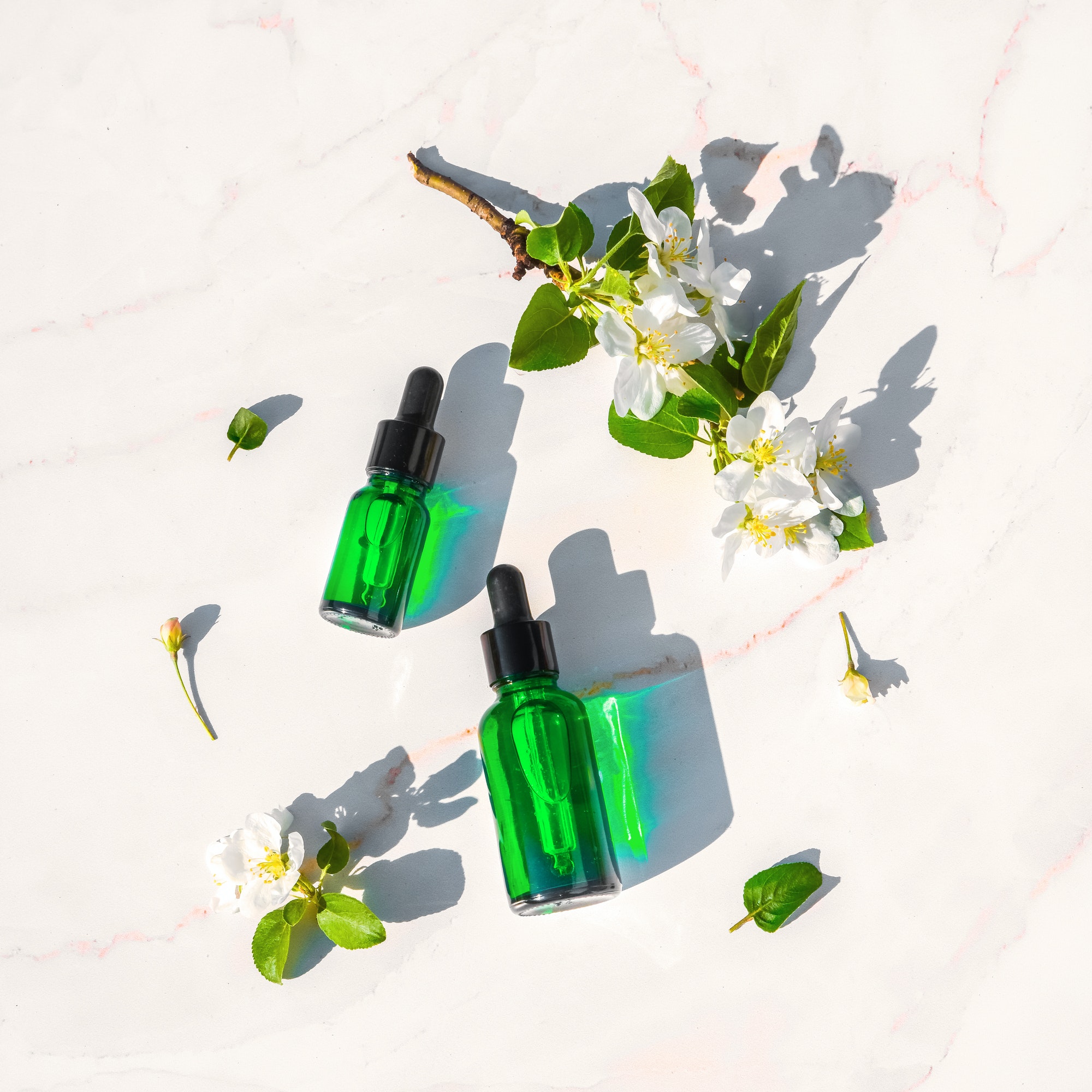 serum-with-herbal-extracts-for-skincare-flat-lay-minimalism